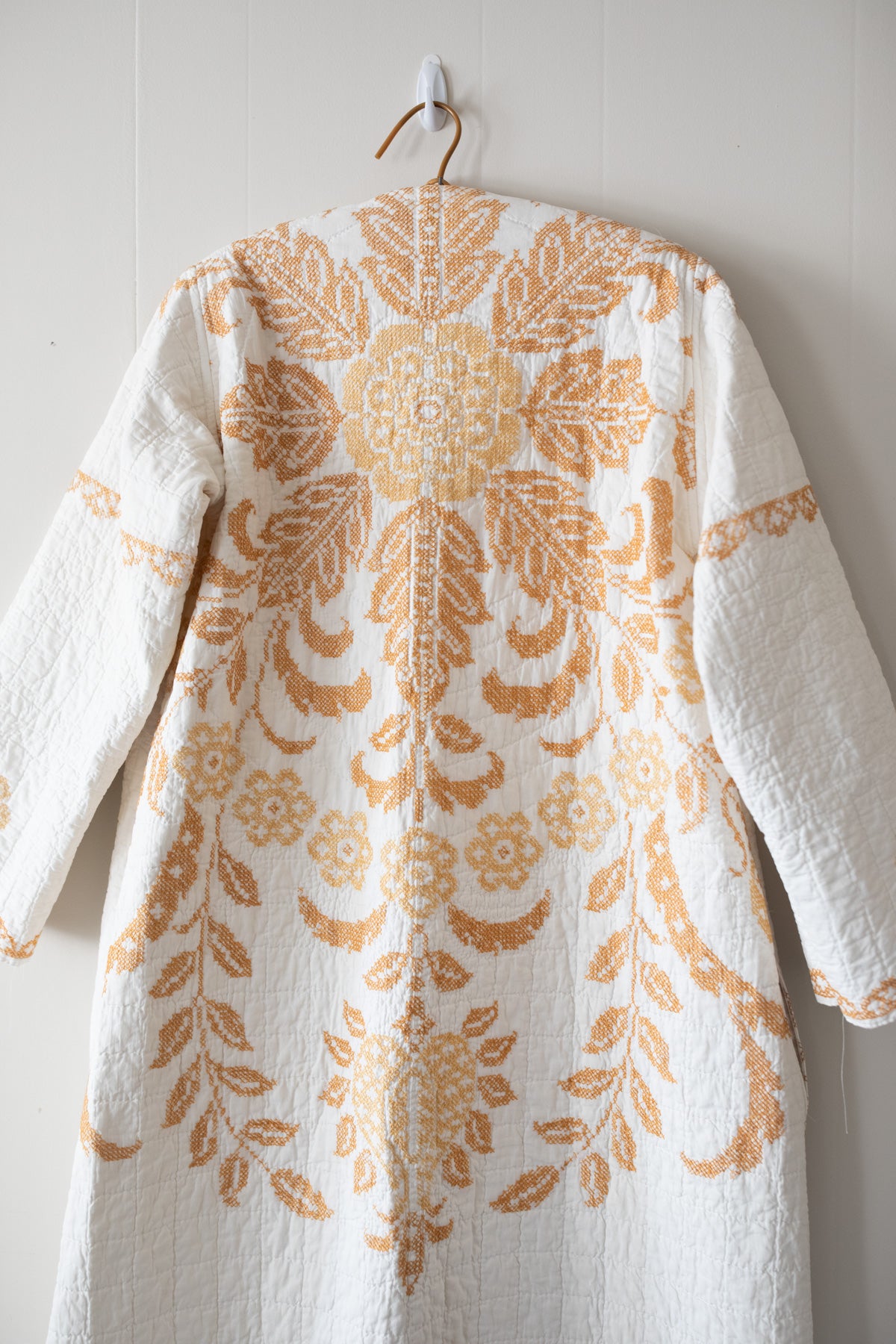 Gold cross stitch quilt jacket