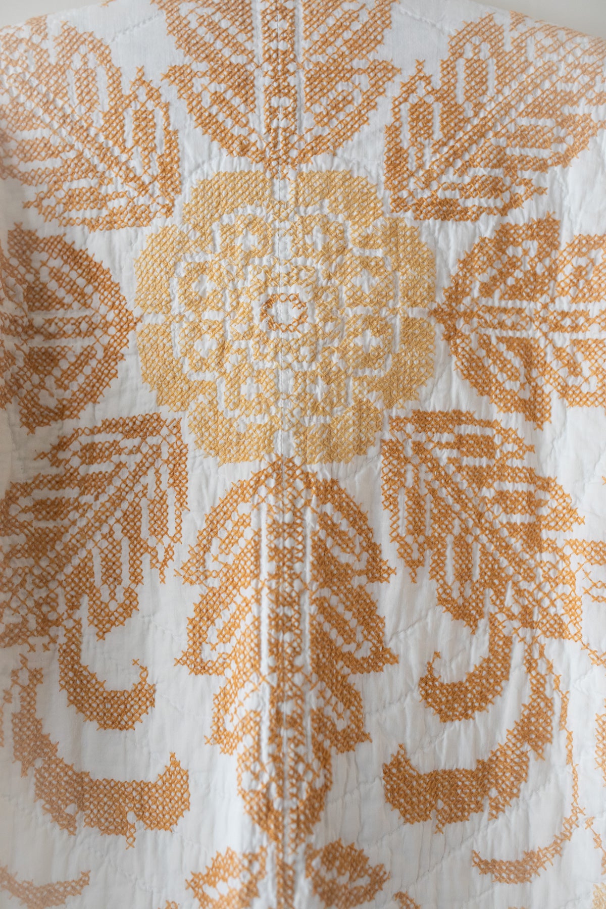 Gold cross stitch quilt jacket