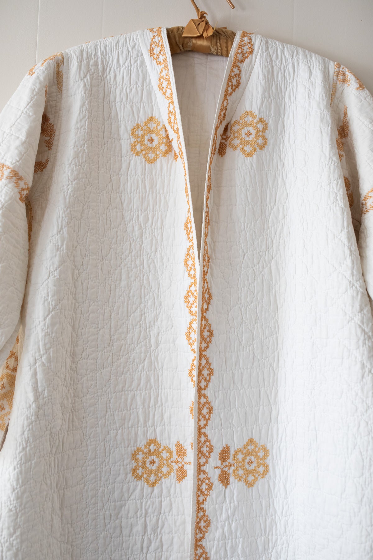 Gold cross stitch quilt jacket