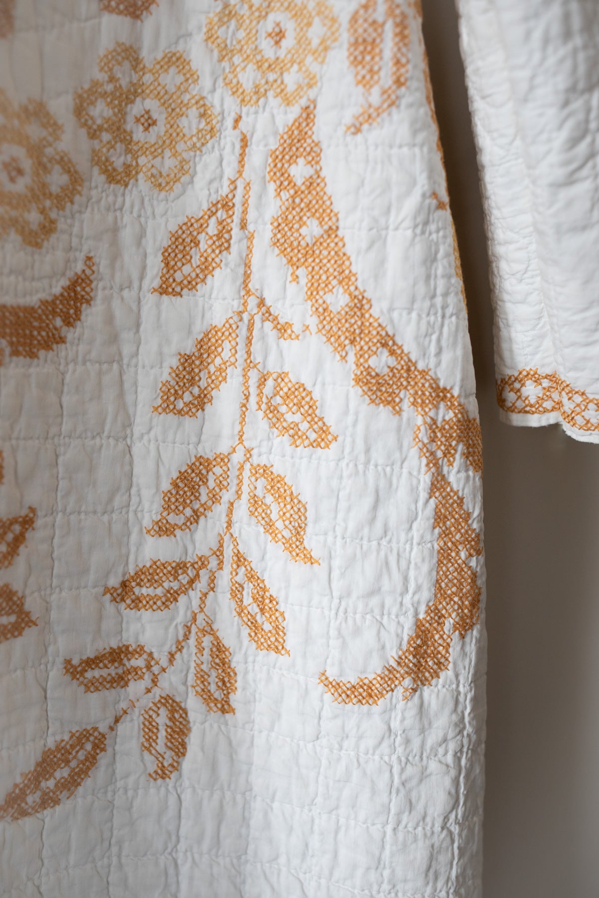 Gold cross stitch quilt jacket